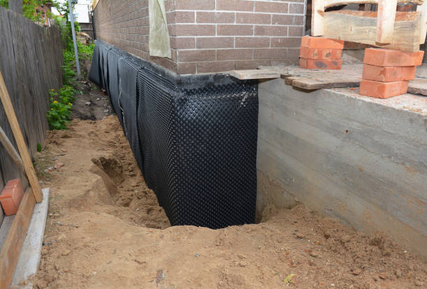 SJ Waterproofing Pros technician performing targeted Waterproofing assessment in Lafayette, OH